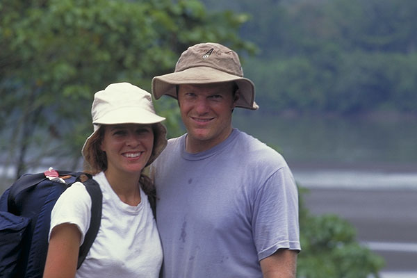 Ana and Justin with Amazon tributary flowing behind